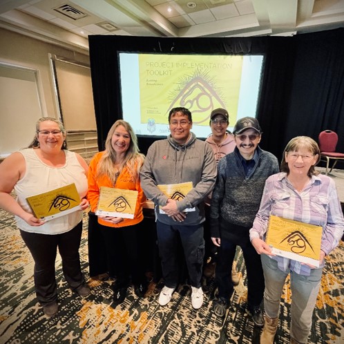 Photo of Janet Knight and a group of other individuals