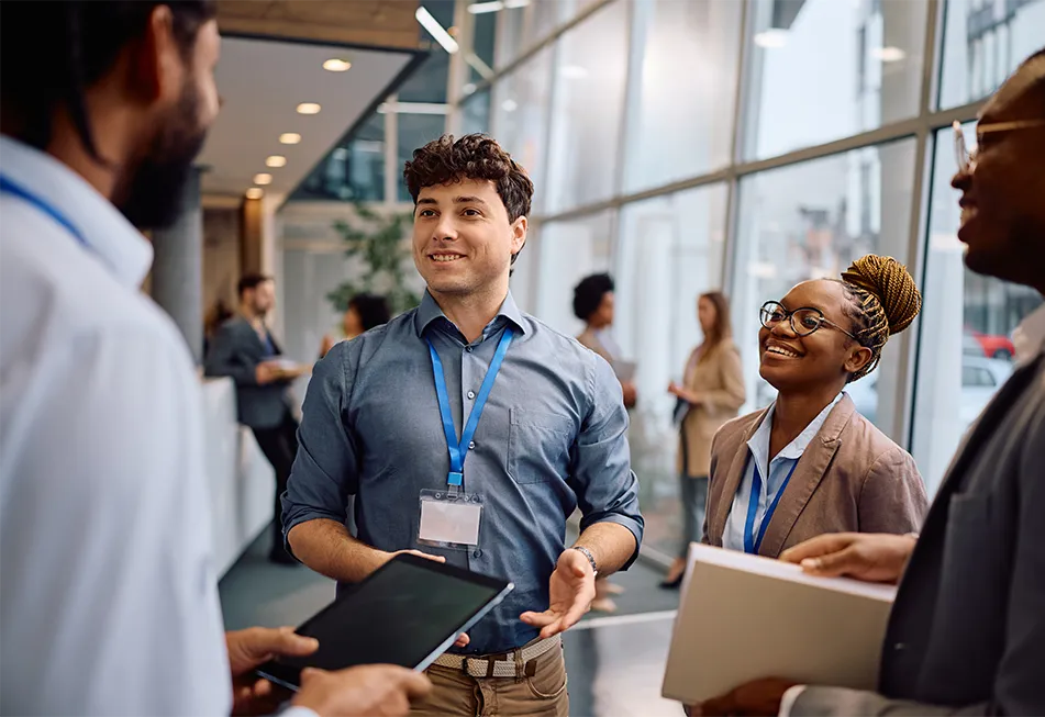 Group of individuals having a discussion at a conference venue