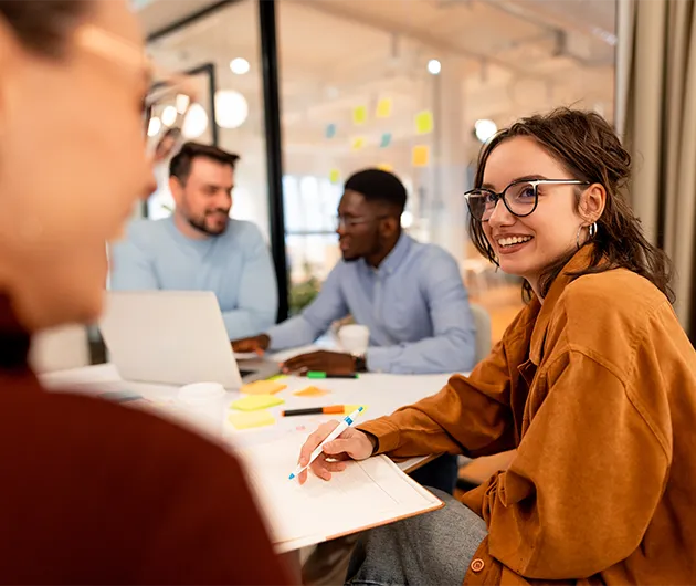 A group having a discussion in a meeting room